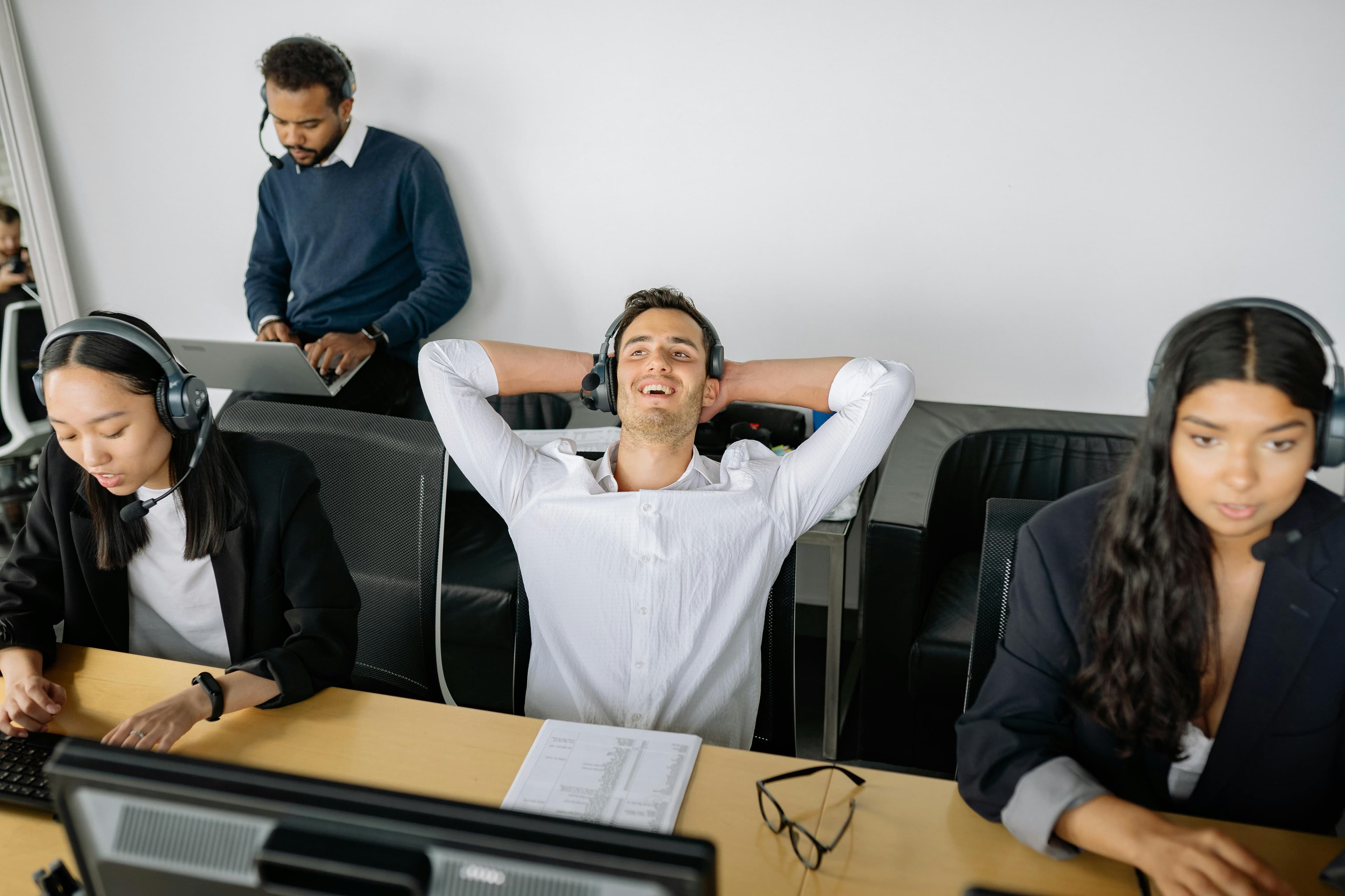 Contact center agent leaning back in a chair